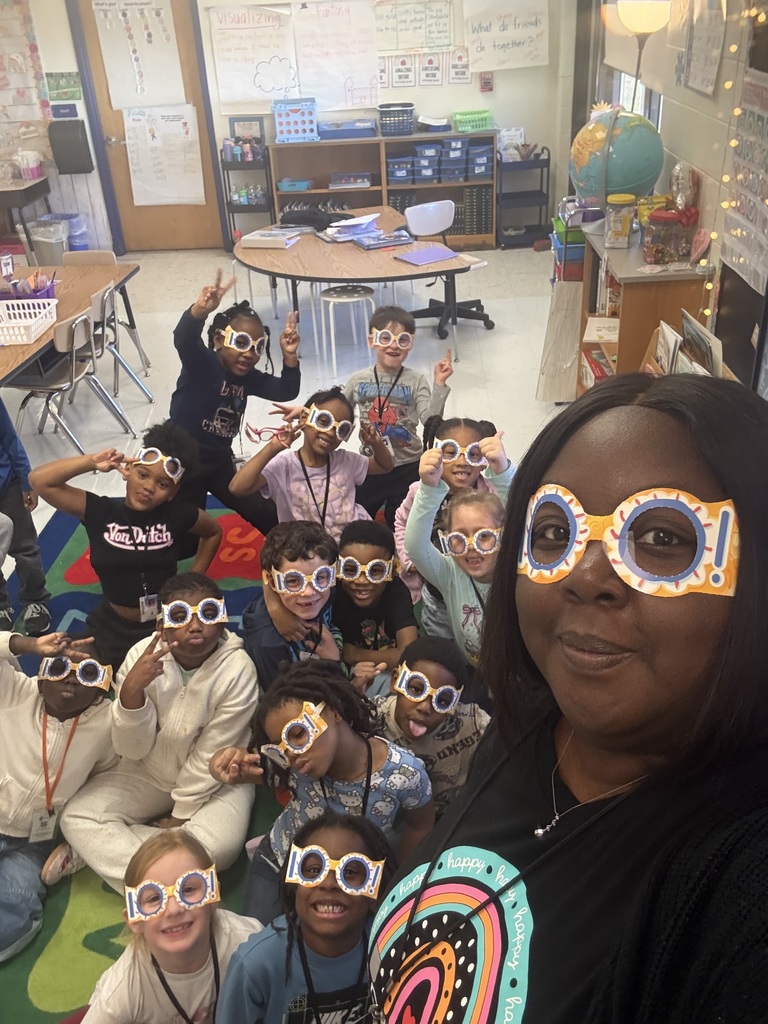 Mrs. Hunter and her students in 100 shades