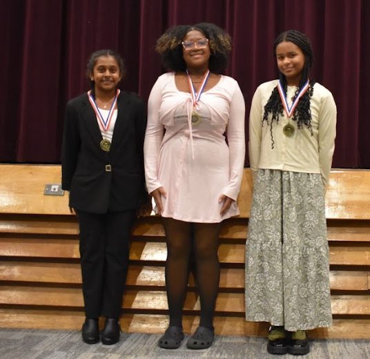 2 girls with medals in Original Oratory