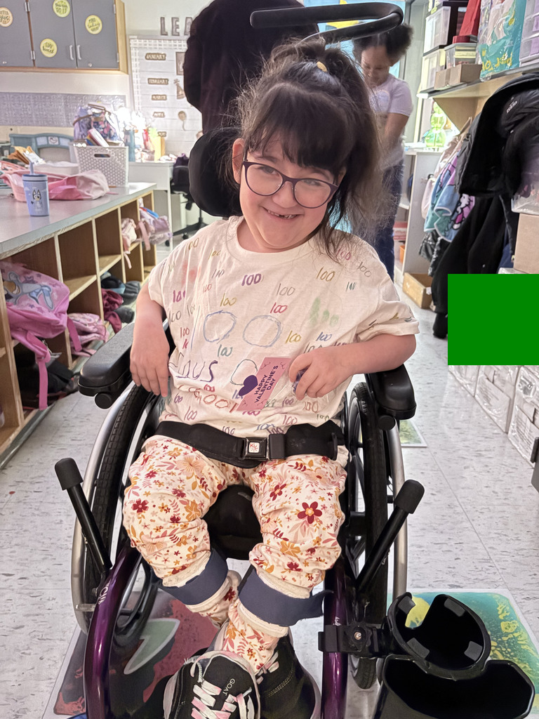 student wearing a homemade 100 shirt