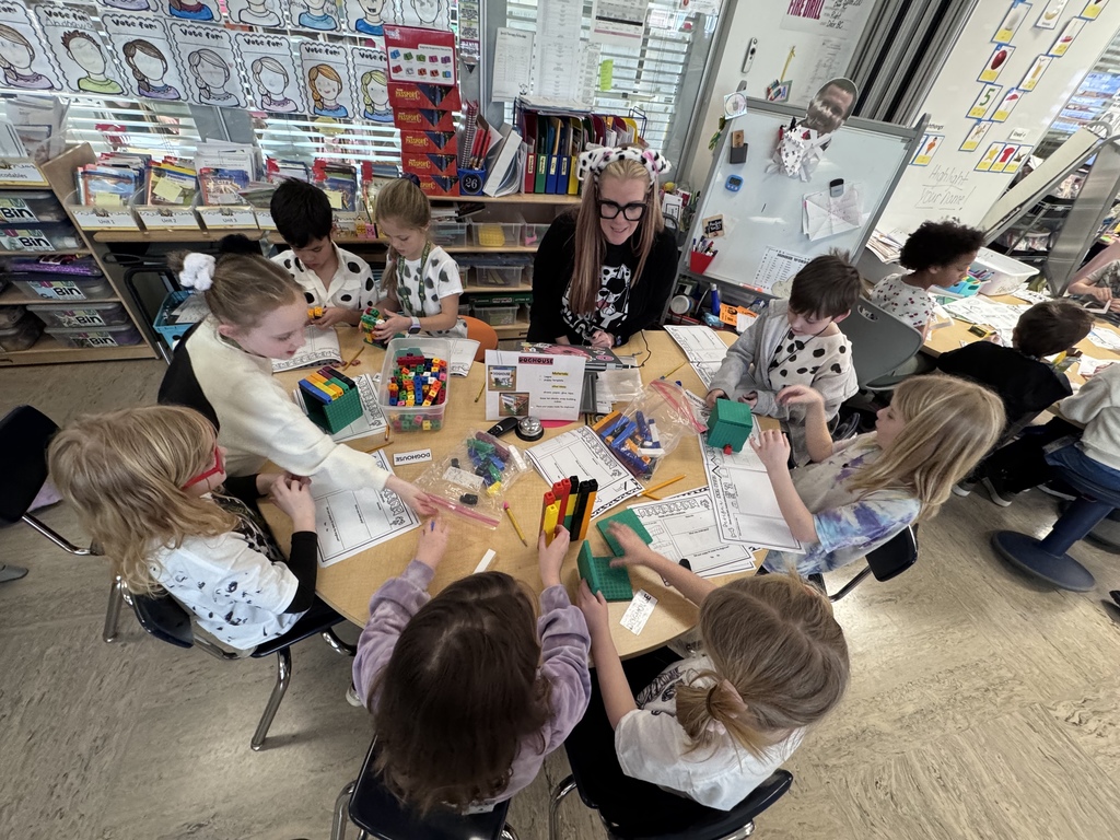 Ms. Addington with a group of students on the 101st day of school