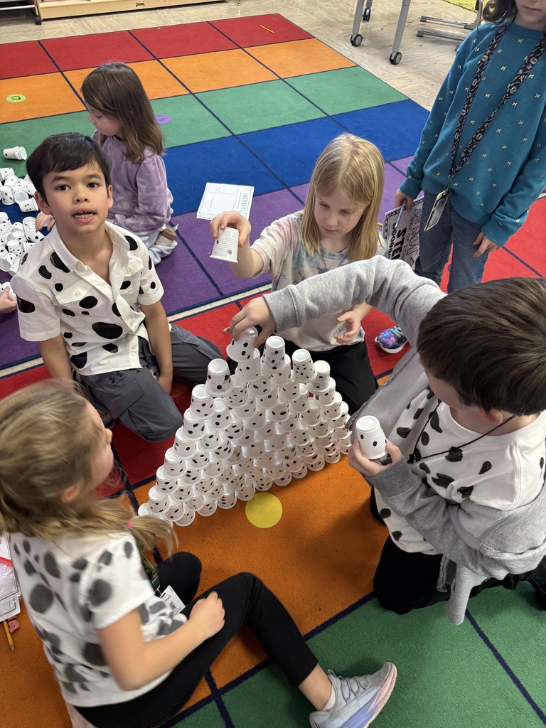 Students building a tower of 101 cups on the 101st day of school