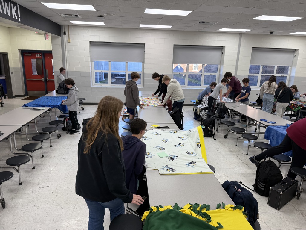 students working on blankets