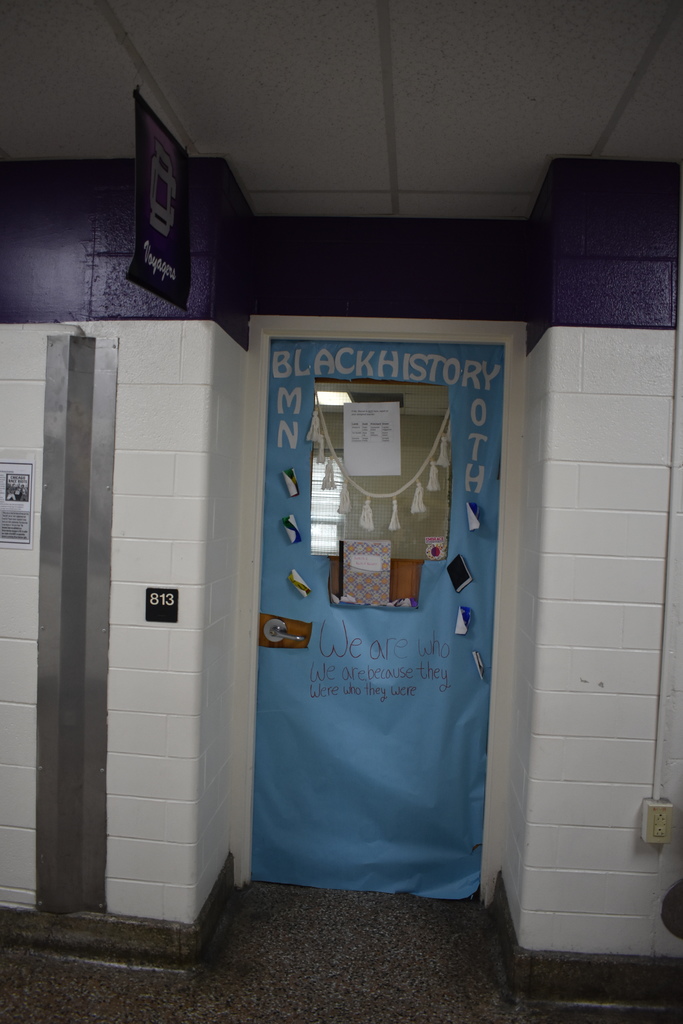 A blue door that says Black History