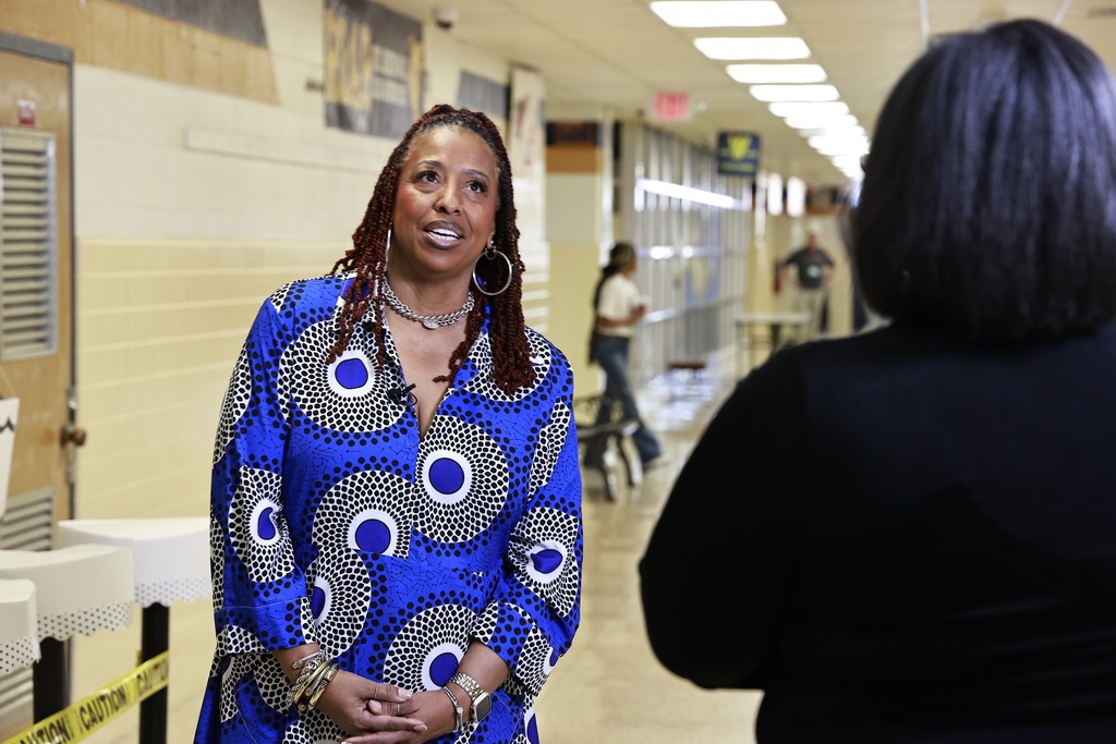 Shay Duncan Looking up while talking to reporter