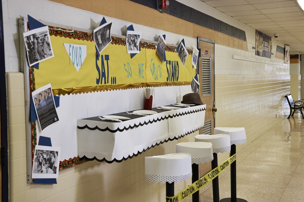 Bulletin Board Display of counter for the 4 men sit in
