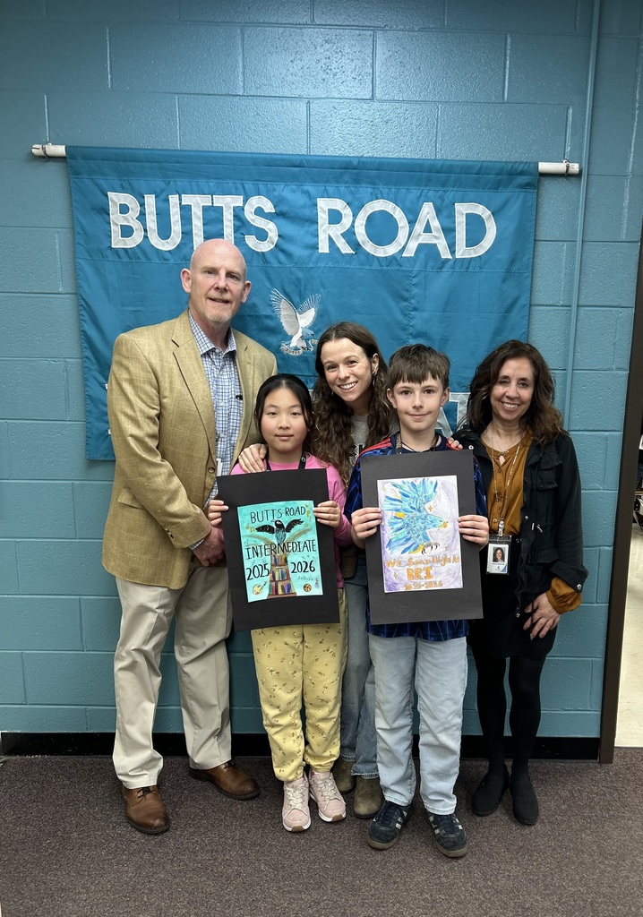 Photo of yearbook cover contest winners: Adam Flynn from Ms. Karasconyi's class and Rachel Chen from Mrs. Halsey's class!  