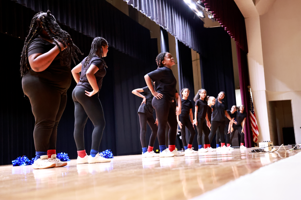 Step team performing on stage