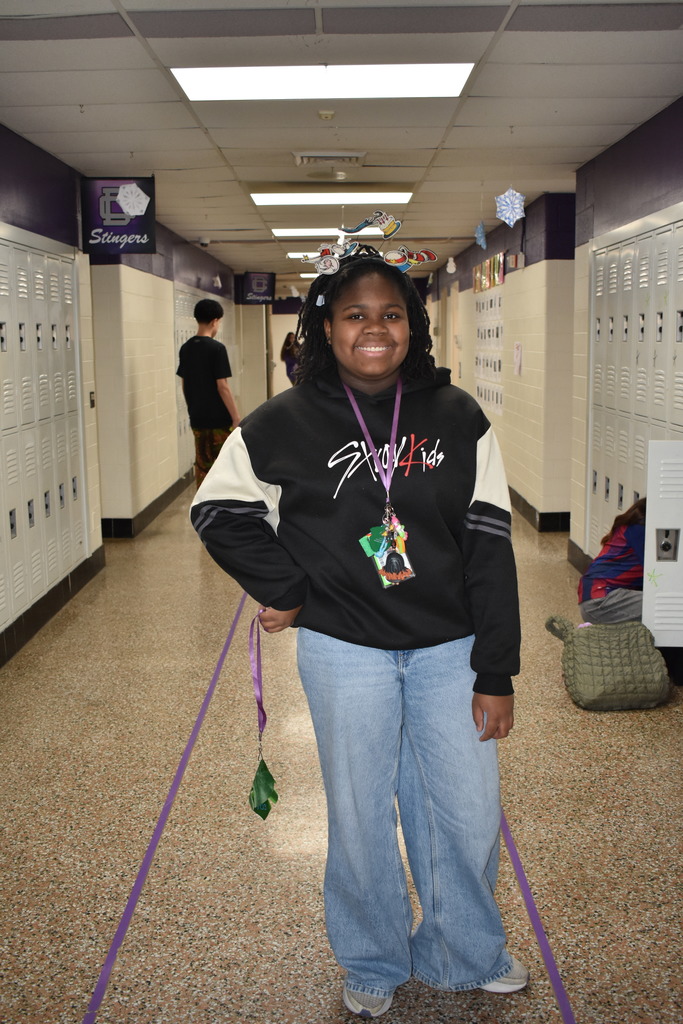 A student wearing a Dr. Seuss headband