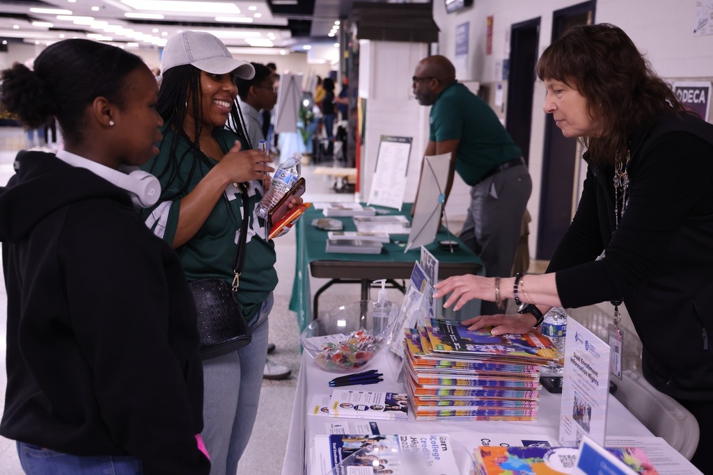 Resource fair where families are obtaining information.
