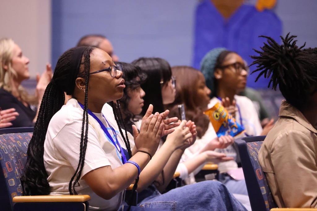 Students clapping.