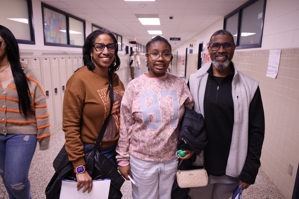A family smiling together.
