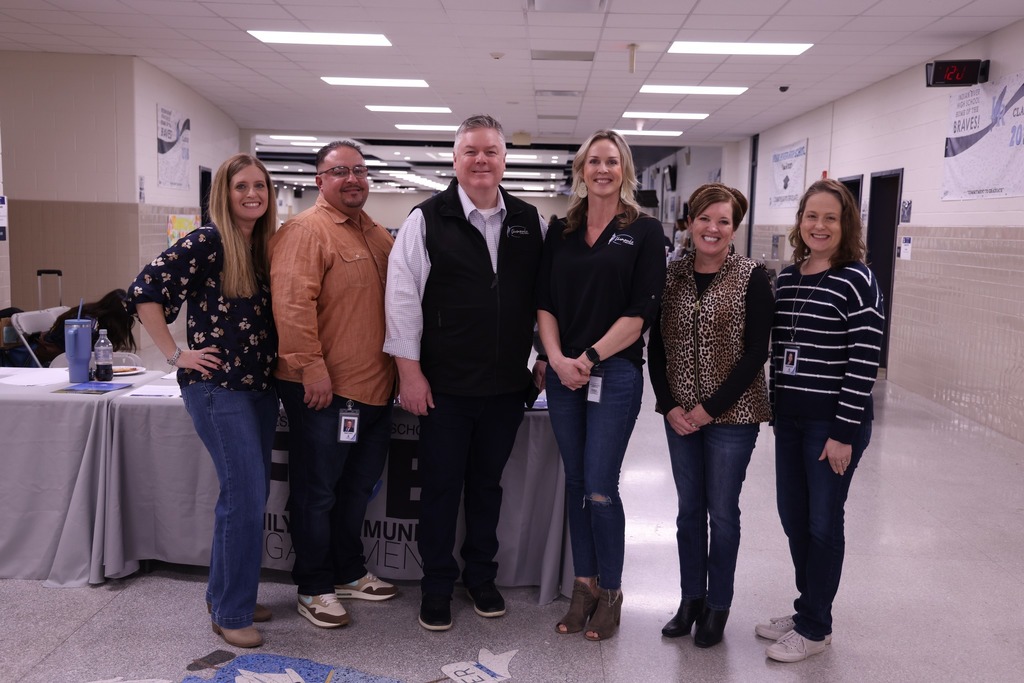 Dr. Cotton and members of the School Board and his staff.