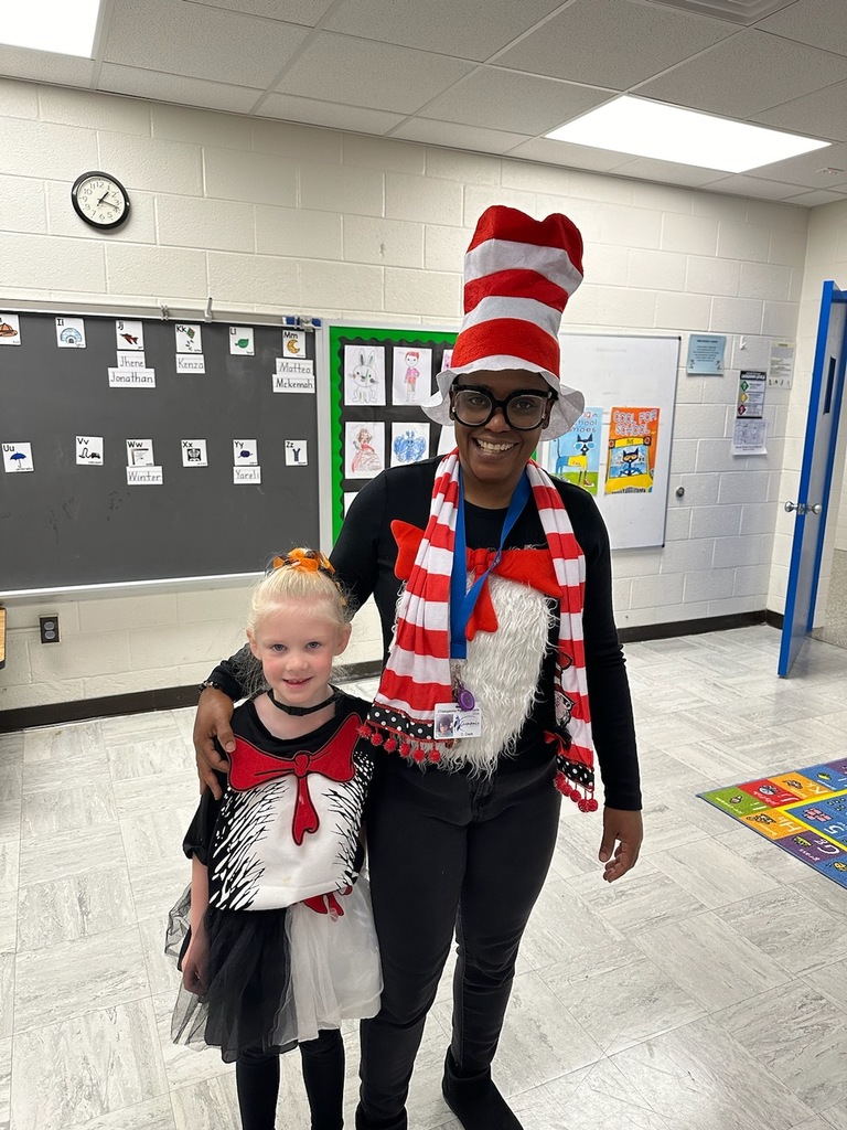 Cat and the Hat costumes of student and teacher.