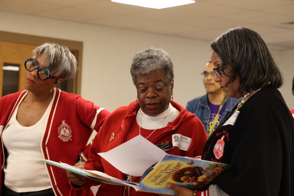 two sorority sister reading books