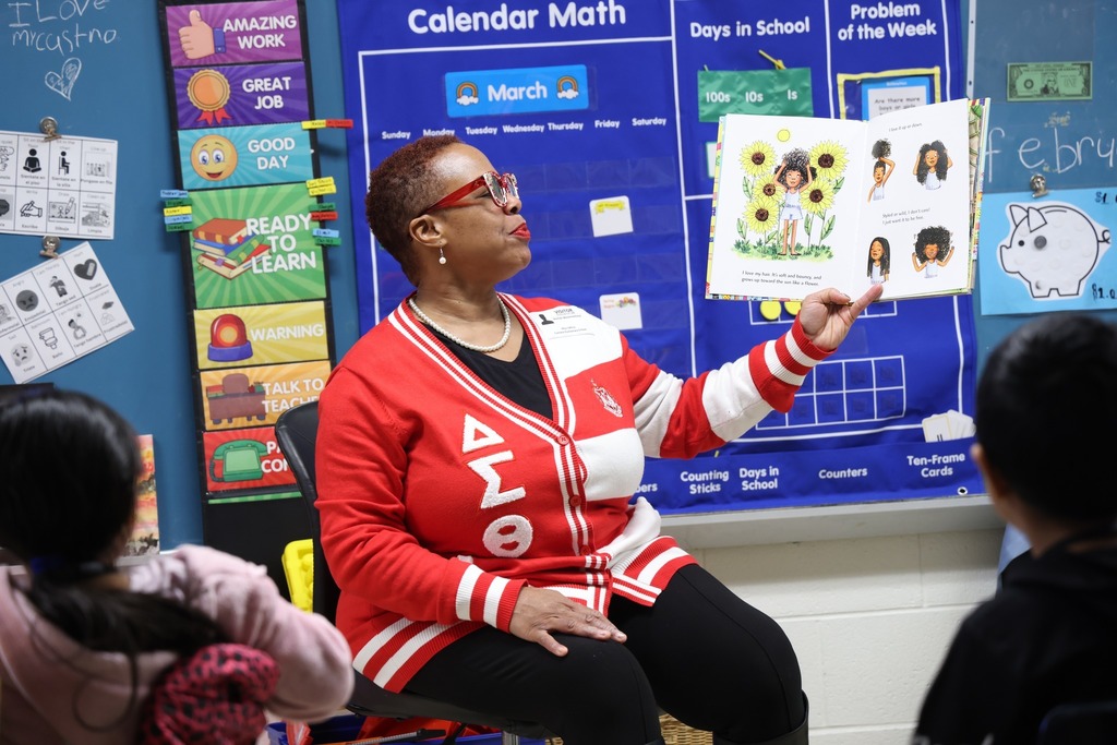 sorority sister reading in classroom
