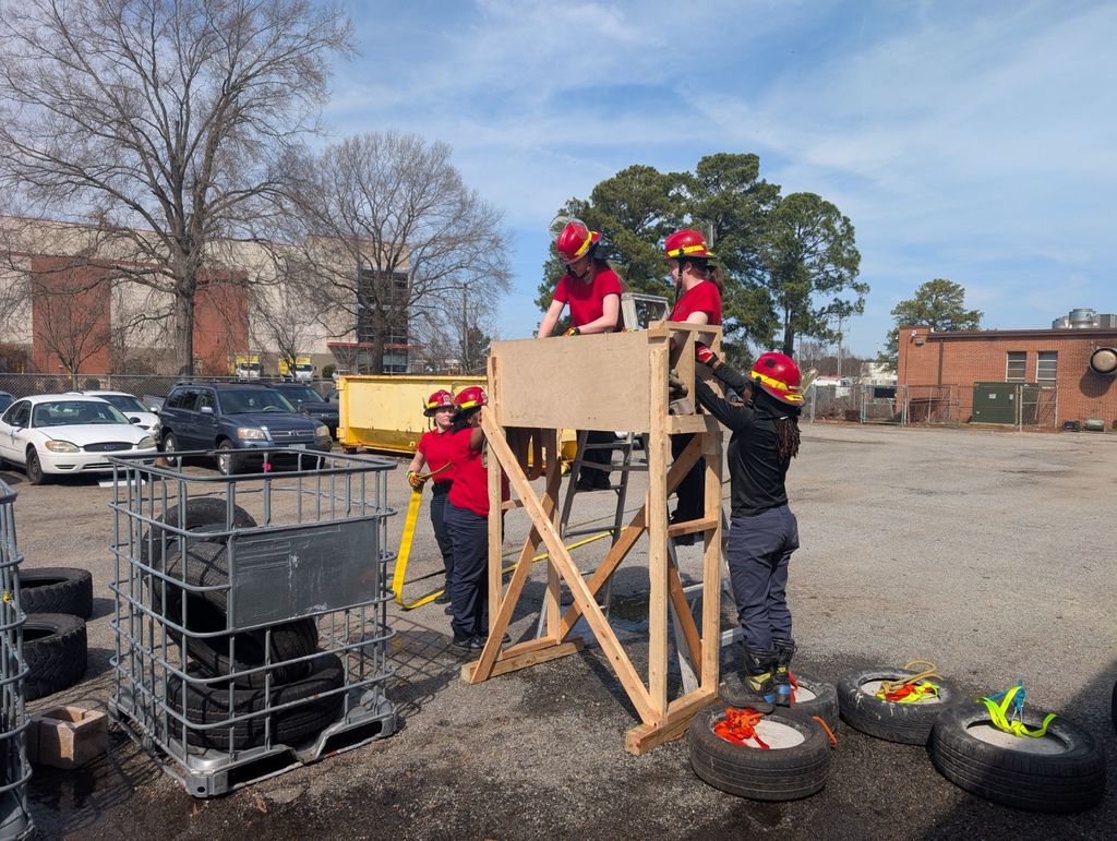 Firefighting students practicing hose drills