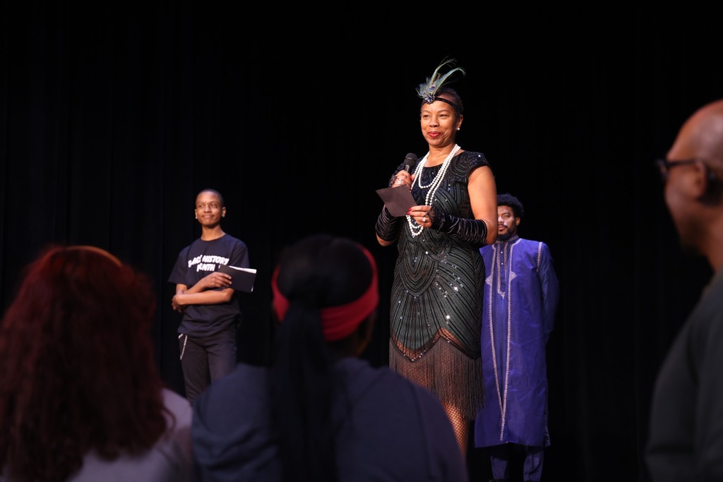 Crestwood Middle teacher and students performing in a 1920's outfit.