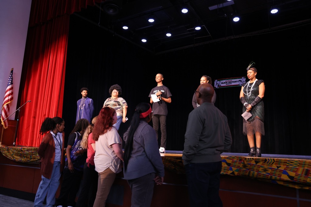 Crestwood Middle students and teachers performing and dancing.