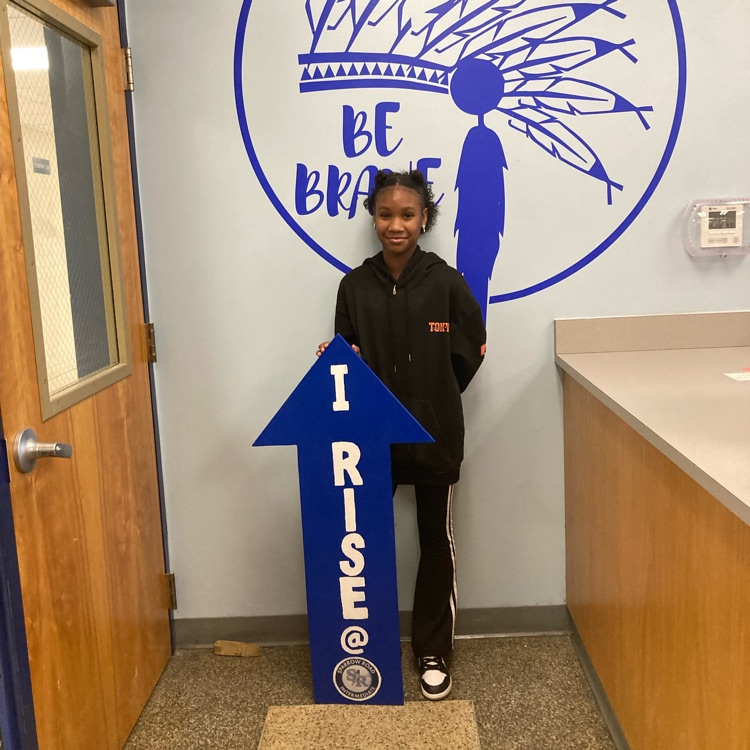 student with RISE arrow