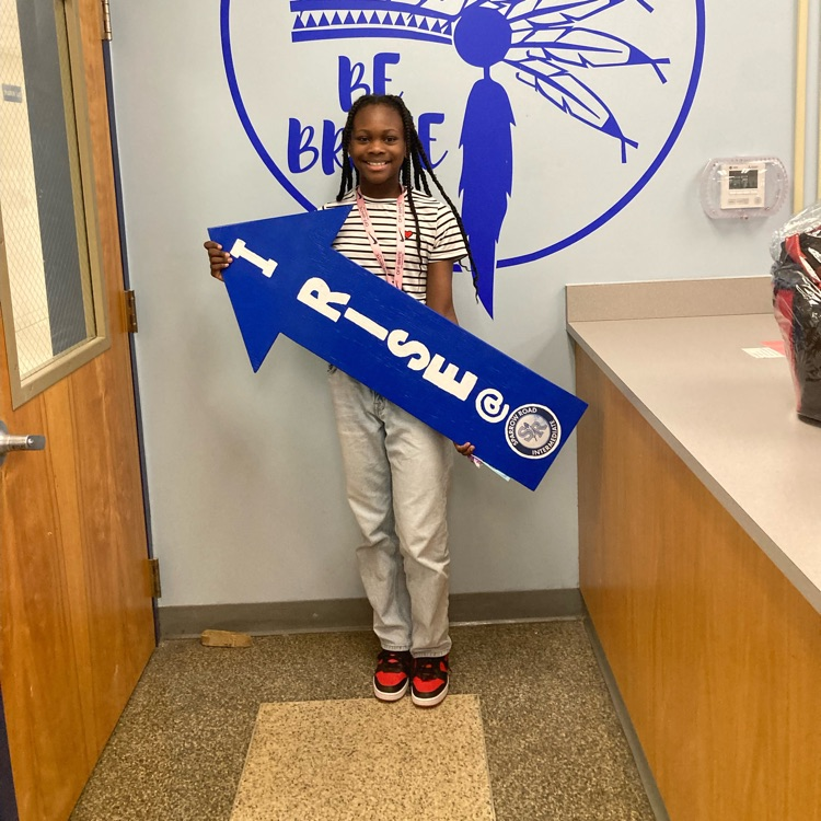 student with RISE arrow