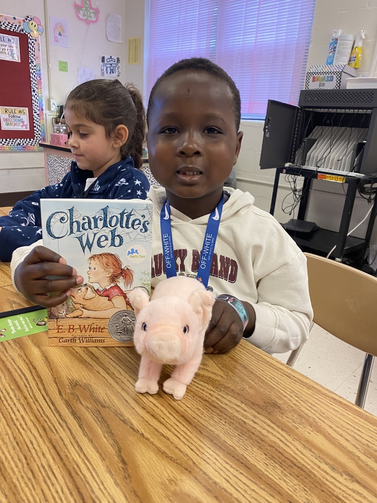 students & staff reading charlottes web