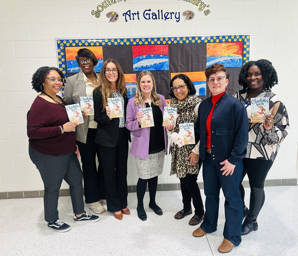students & staff reading charlottes web