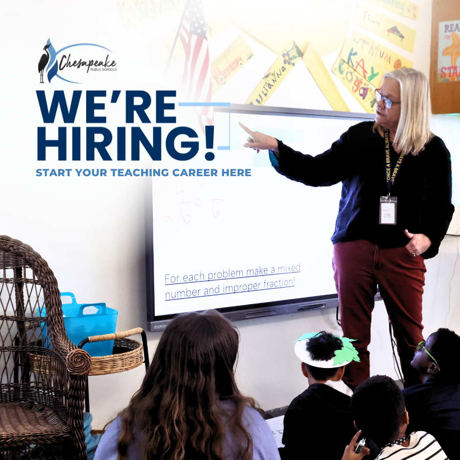 teacher at smart board kids watching on floor