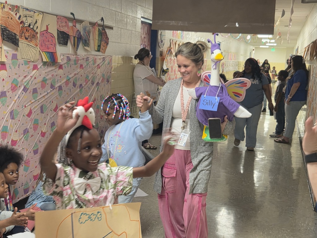 Mrs. Z with her porch goose and students in Vocab parade.