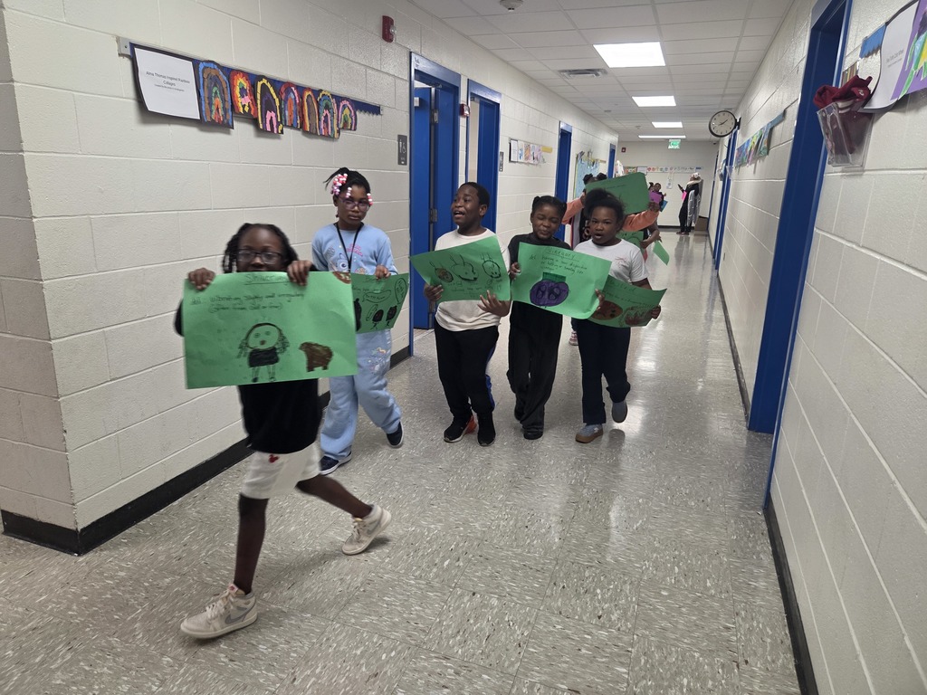 5 of Mrs. Jahn's students coming around the corner for the vocab parade.