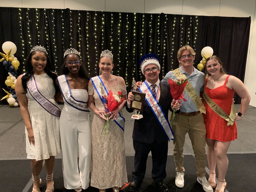 group of students with Mr and Miss Abilities smiling