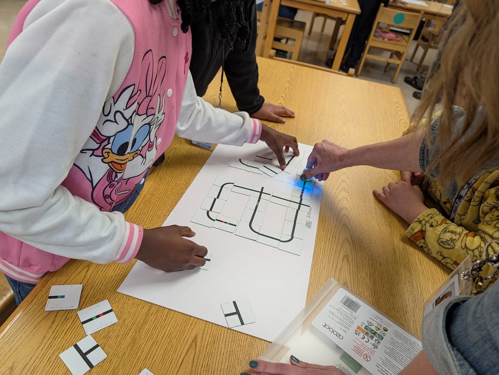 students coding with ozobots and magnets
