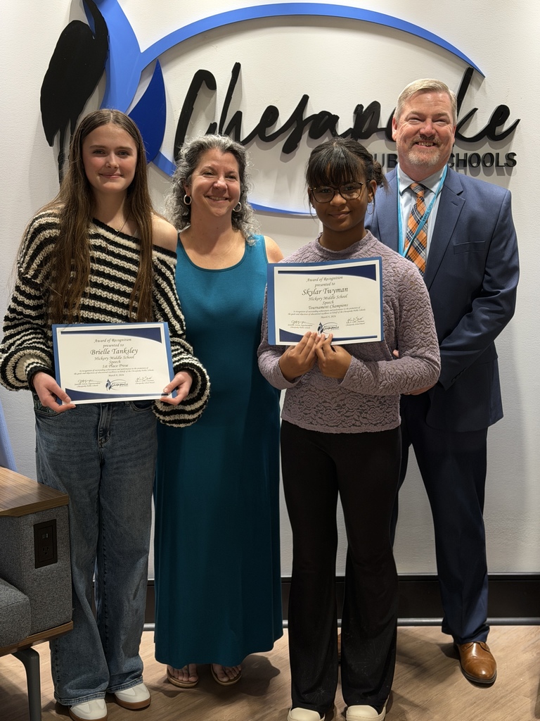 speech students with their certificates from the school board with their coach and the principal