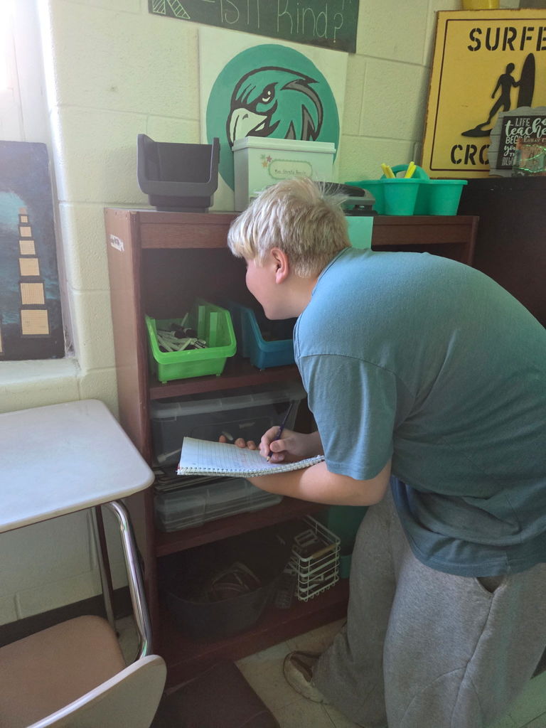 students working on a scavenger hunt in math class