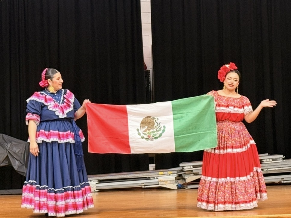 Ballet Folklorico presenting the flag of Mexico and sharing their heritage