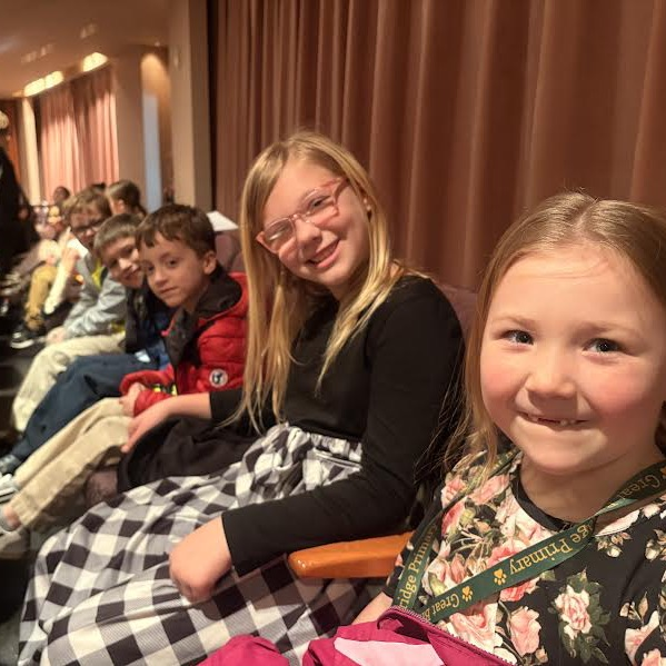 2nd grade students seated and ready to watch the Alice and Wonderland ballet