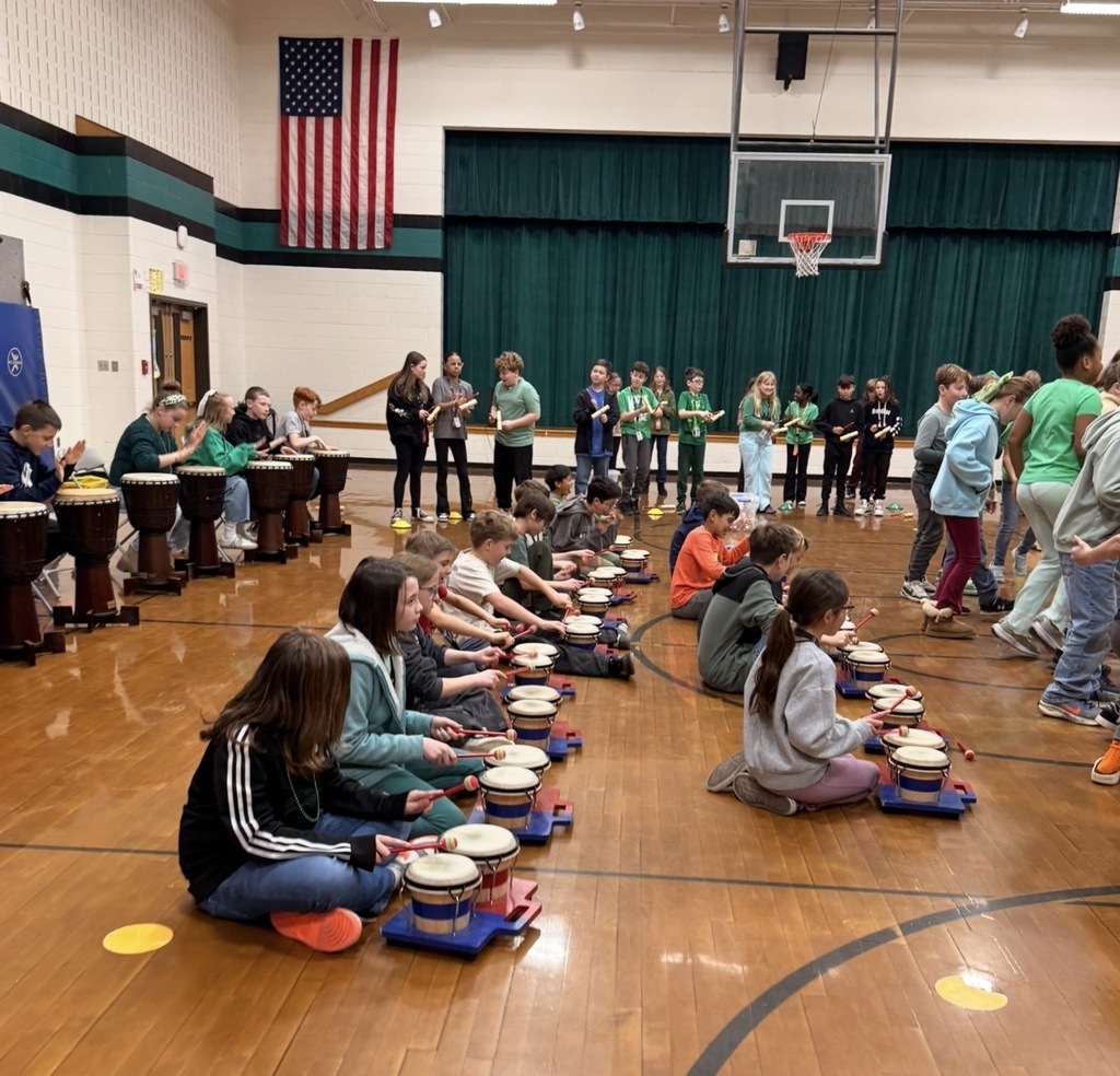Students exploring different drums during our Drum Assembly.