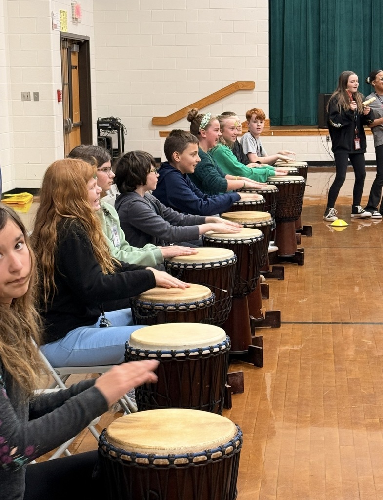 Students exploring different drums during our Drum Assembly.