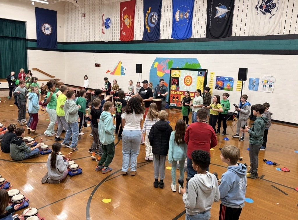 Students exploring different drums during our Drum Assembly.