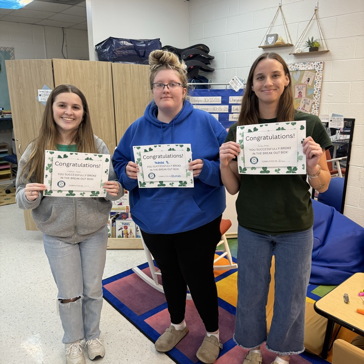 students completing a st Patrick themed break out box