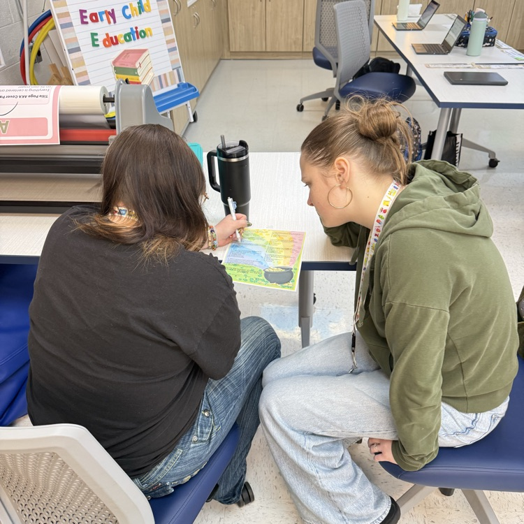 students completing a st Patrick themed break out box