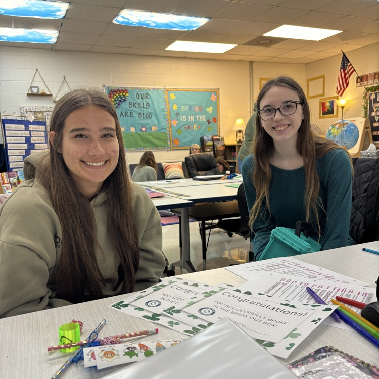 students completing a st Patrick themed break out box