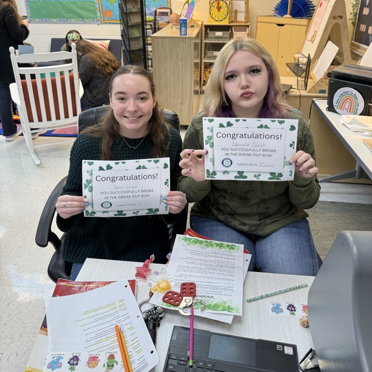 students completing a st Patrick themed break out box