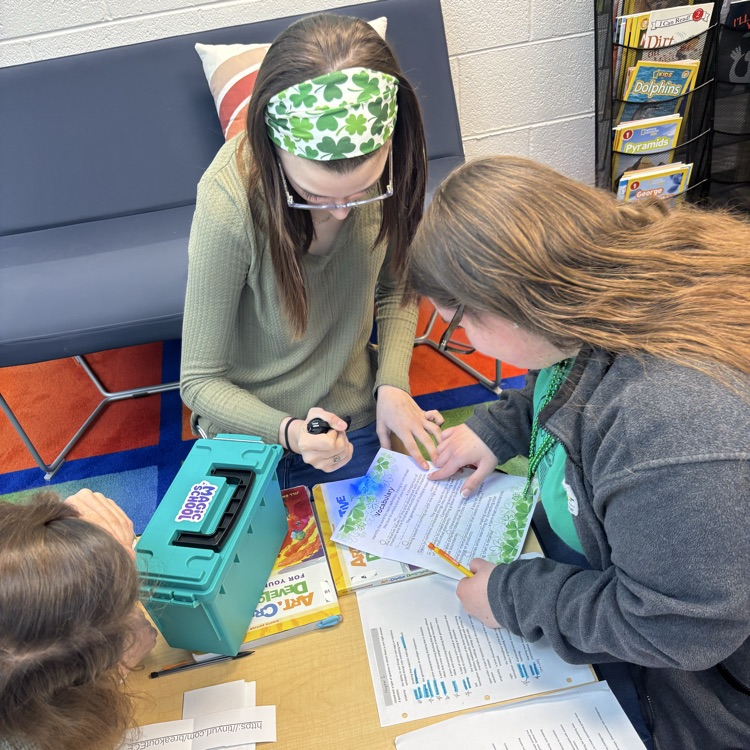 students completing a st Patrick themed break out box