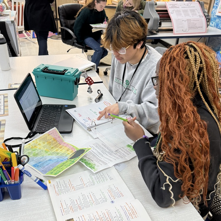 students completing a st Patrick themed break out box