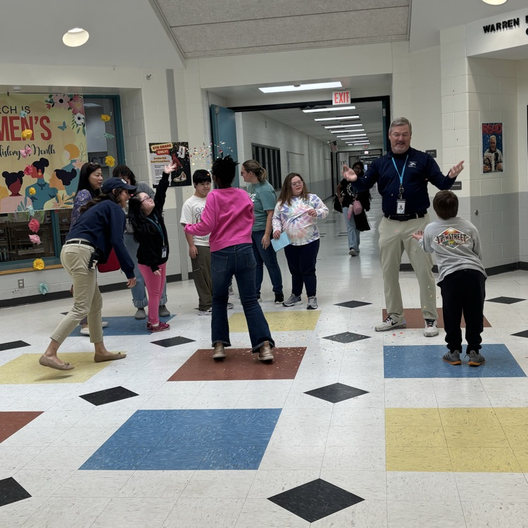 students celebrating our principal on his birthday