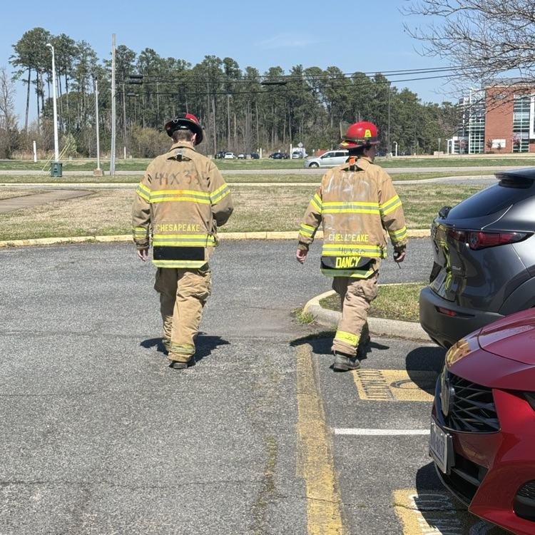 fire fighting students checking on the drill