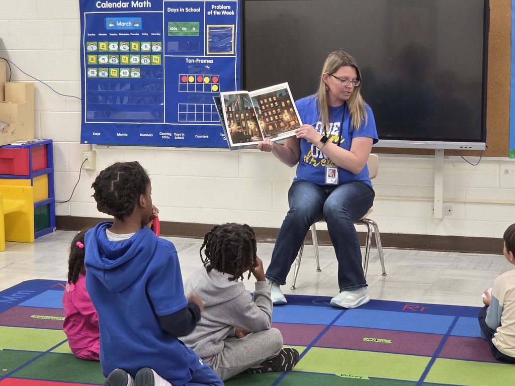 Mrs. Williamson reading a story.