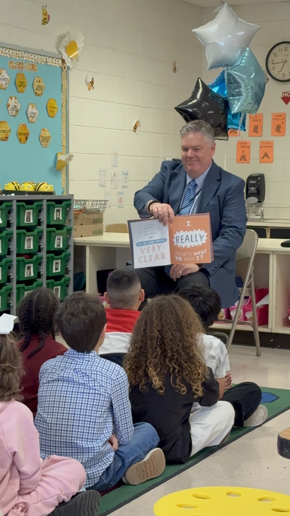 Dr. Cotton reading to Ms. Satchell's class