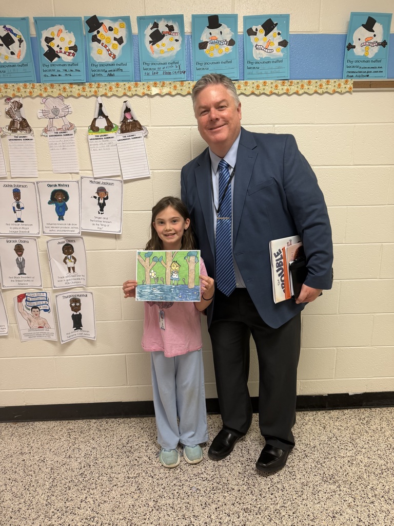 Dr. Cotton reading to Ms. Satchell's class