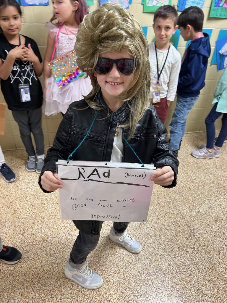 students walking in a parade dressed up for the vocabulary parade